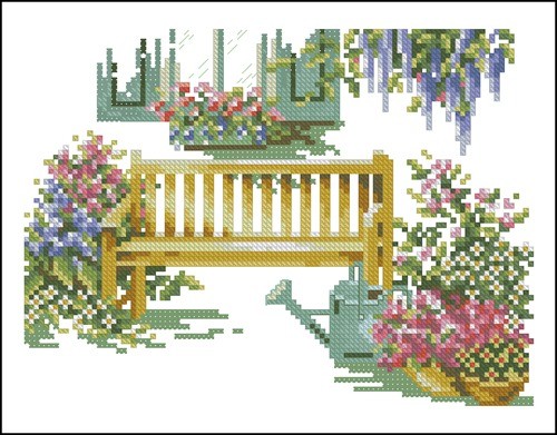 Сад с цветами и скамейка
