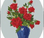 Красные розы в голубой вазе
