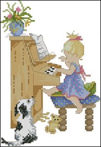 Маленькая девочка играет на пианино