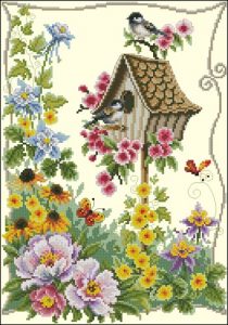 Birdhouse amongst flowers