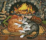 Кошки у камина